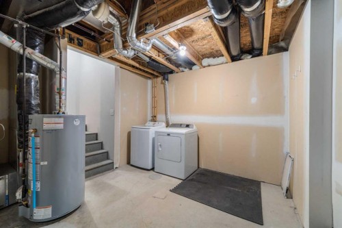 130 Promenade Way Se, Calgary, AB - Indoor Photo Showing Laundry Room