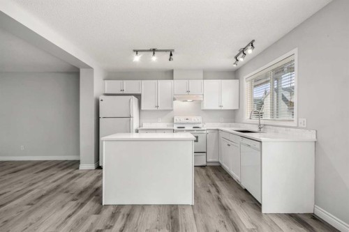 130 Promenade Way Se, Calgary, AB - Indoor Photo Showing Kitchen