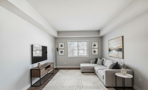1213-2461 Baysprings Link Sw, Airdrie, AB - Indoor Photo Showing Living Room
