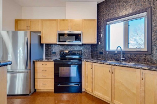 403-3810 43 Street Sw, Calgary, AB - Indoor Photo Showing Kitchen With Double Sink