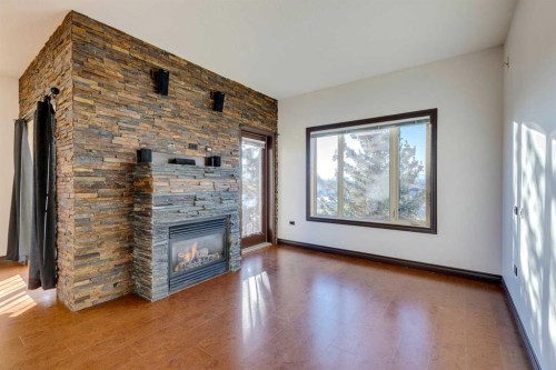 403-3810 43 Street Sw, Calgary, AB - Indoor Photo Showing Other Room With Fireplace