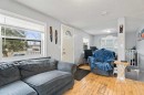 7417 24 Street Se, Calgary, AB  - Indoor Photo Showing Living Room 
