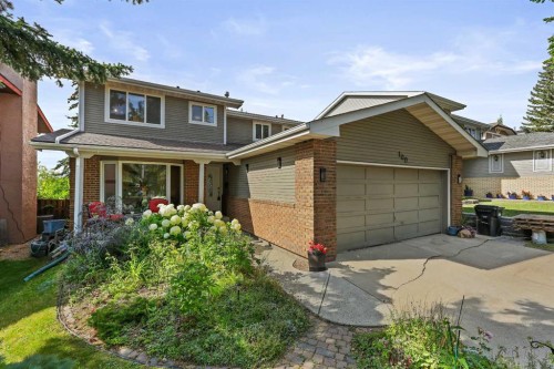 100 Hawkfield Crescent Nw, Calgary, AB - Outdoor With Deck Patio Veranda With Exterior