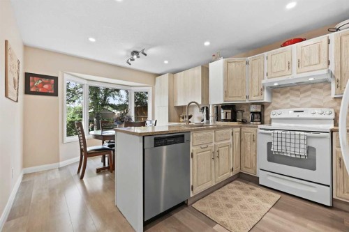 100 Hawkfield Crescent Nw, Calgary, AB - Indoor Photo Showing Kitchen