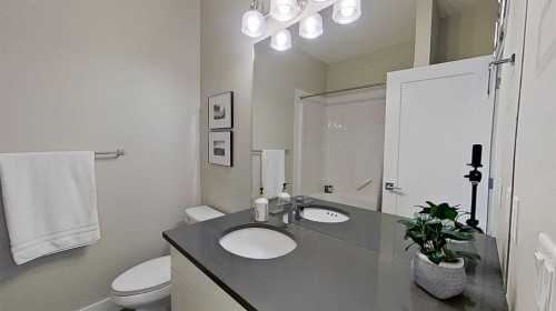 130 Riverwood Crescent Sw, Diamond Valley, AB - Indoor Photo Showing Bathroom