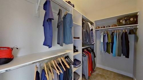 130 Riverwood Crescent Sw, Diamond Valley, AB - Indoor With Storage