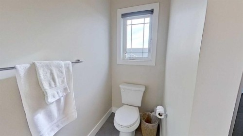 130 Riverwood Crescent Sw, Diamond Valley, AB - Indoor Photo Showing Bathroom