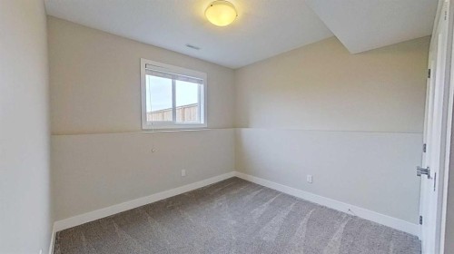 130 Riverwood Crescent Sw, Diamond Valley, AB - Indoor Photo Showing Other Room