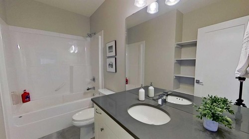 130 Riverwood Crescent Sw, Diamond Valley, AB - Indoor Photo Showing Bathroom