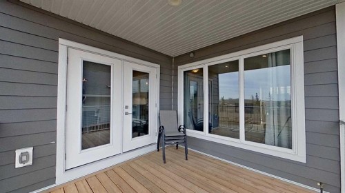130 Riverwood Crescent Sw, Diamond Valley, AB - Outdoor With Deck Patio Veranda With Exterior