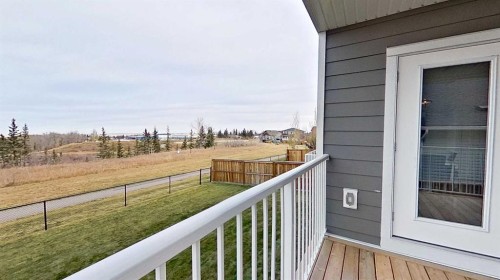 130 Riverwood Crescent Sw, Diamond Valley, AB - Outdoor With Exterior