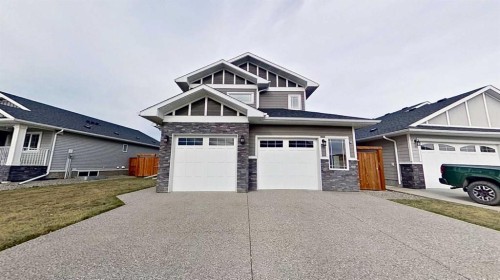 130 Riverwood Crescent Sw, Diamond Valley, AB - Outdoor