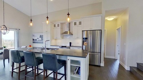 130 Riverwood Crescent Sw, Diamond Valley, AB - Indoor Photo Showing Kitchen With Stainless Steel Kitchen With Upgraded Kitchen