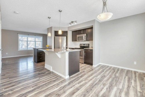 65 Marine Drive Se, Calgary, AB - Indoor Photo Showing Kitchen With Stainless Steel Kitchen With Upgraded Kitchen