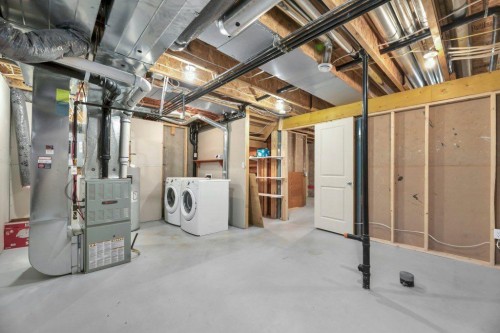 65 Marine Drive Se, Calgary, AB - Indoor Photo Showing Laundry Room