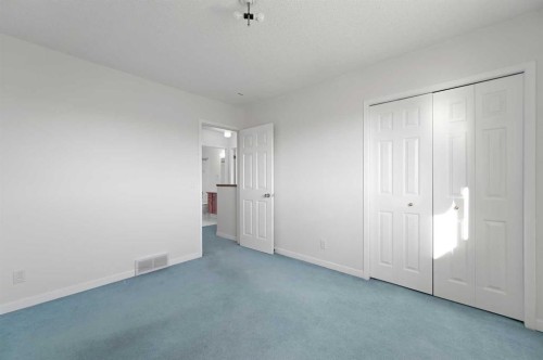182 Coventry Close Ne, Calgary, AB - Indoor Photo Showing Other Room