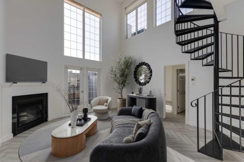 403-527 15 Avenue Sw, Calgary, AB - Indoor Photo Showing Living Room With Fireplace