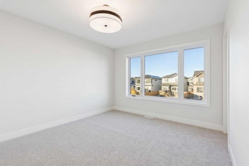 120 Quartz Crescent, Cochrane, AB - Indoor Photo Showing Other Room