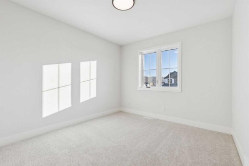 120 Quartz Crescent, Cochrane, AB - Indoor Photo Showing Other Room