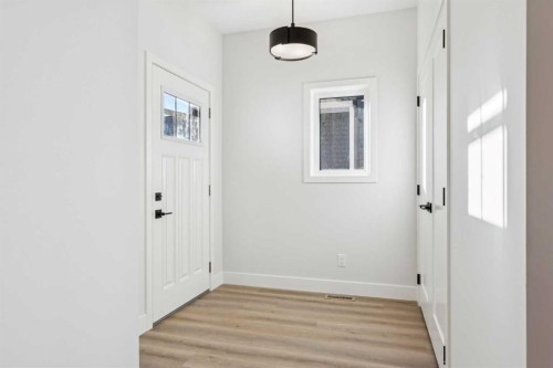 120 Quartz Crescent, Cochrane, AB - Indoor Photo Showing Other Room
