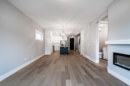 925 Reynolds Lane Sw, Airdrie, AB - Indoor With Fireplace