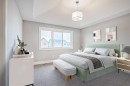 925 Reynolds Lane Sw, Airdrie, AB  - Indoor Photo Showing Bedroom 