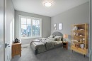 925 Reynolds Lane Sw, Airdrie, AB  - Indoor Photo Showing Bedroom 