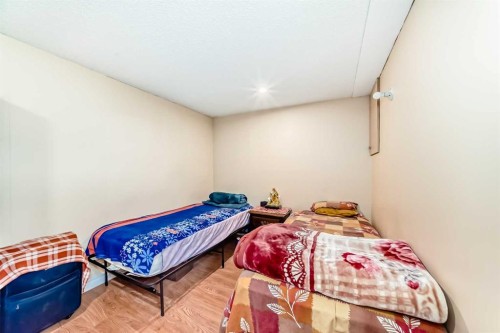 120 Pineset Place Ne, Calgary, AB - Indoor Photo Showing Bedroom