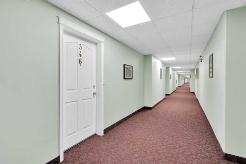 346-165 Manora Place Ne, Calgary, AB - Indoor Photo Showing Other Room