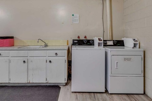 810 Drury Avenue Ne, Calgary, AB - Indoor Photo Showing Laundry Room