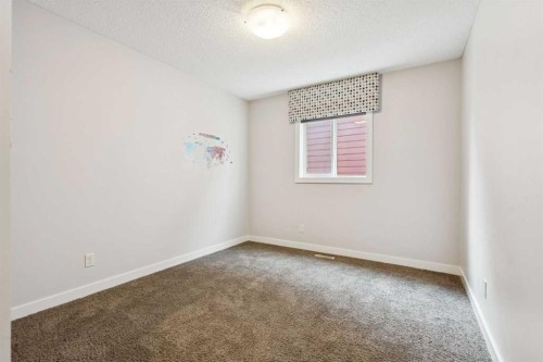 15 Sherwood Gate Nw, Calgary, AB - Indoor Photo Showing Other Room