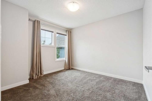15 Sherwood Gate Nw, Calgary, AB - Indoor Photo Showing Other Room