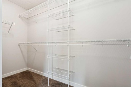 15 Sherwood Gate Nw, Calgary, AB - Indoor With Storage