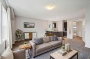 15 Sherwood Gate Nw, Calgary, AB  - Indoor Photo Showing Living Room 