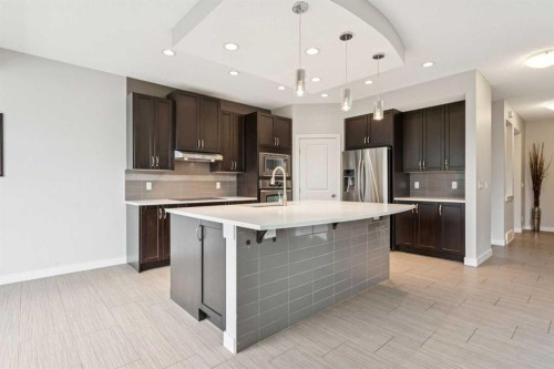 15 Sherwood Gate Nw, Calgary, AB - Indoor Photo Showing Kitchen With Upgraded Kitchen
