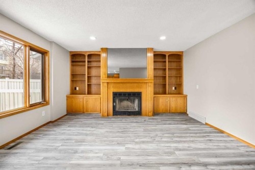 650 Sandringham Place Nw, Calgary, AB - Indoor With Fireplace