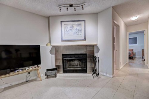 1501 3 Street Nw, Calgary, AB - Indoor Photo Showing Living Room With Fireplace