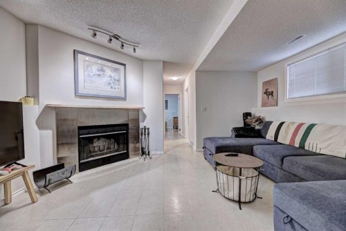 1501 3 Street Nw, Calgary, AB - Indoor Photo Showing Living Room With Fireplace