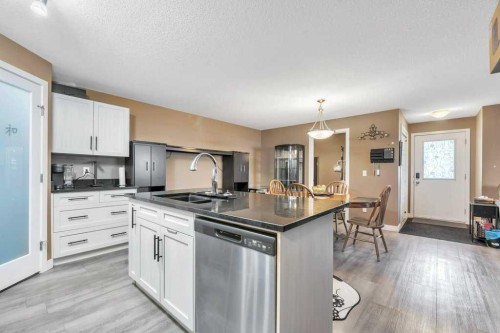 3101-2781 Chinook Winds Drive Sw, Airdrie, AB - Indoor Photo Showing Kitchen With Double Sink