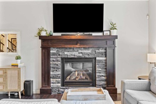 40 Chaparral Valley Green Se, Calgary, AB - Indoor Photo Showing Living Room With Fireplace