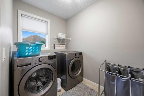 40 Chaparral Valley Green Se, Calgary, AB - Indoor Photo Showing Laundry Room