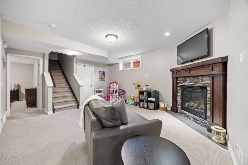 40 Chaparral Valley Green Se, Calgary, AB - Indoor With Fireplace