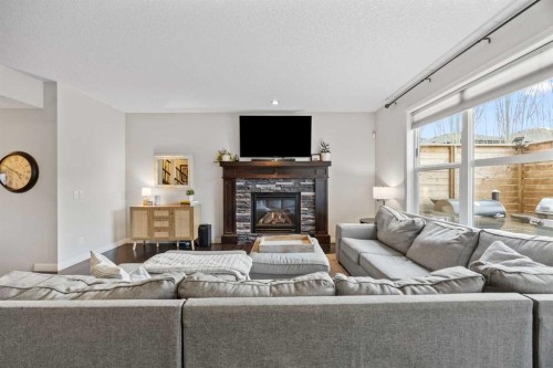 40 Chaparral Valley Green Se, Calgary, AB - Indoor Photo Showing Living Room With Fireplace