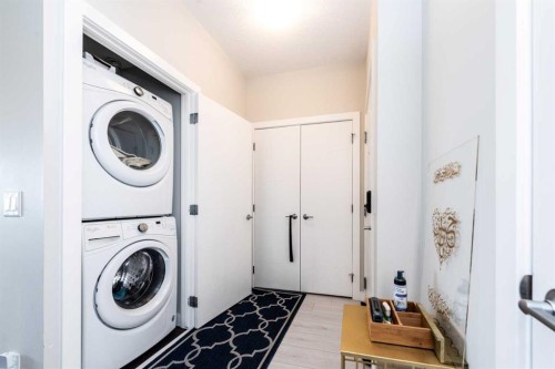 202-24 Sage Hill Terrace Nw, Calgary, AB - Indoor Photo Showing Laundry Room
