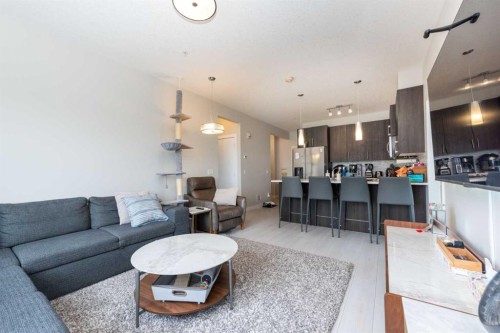 202-24 Sage Hill Terrace Nw, Calgary, AB - Indoor Photo Showing Living Room