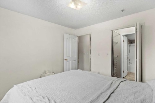 2113-2113 Tuscarora Manor Nw, Calgary, AB - Indoor Photo Showing Bedroom