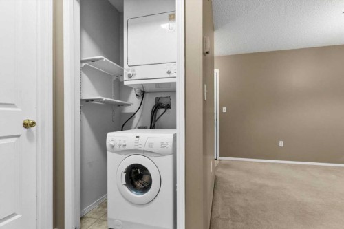 2113-2113 Tuscarora Manor Nw, Calgary, AB - Indoor Photo Showing Laundry Room