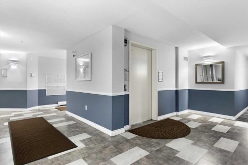 2113-2113 Tuscarora Manor Nw, Calgary, AB - Indoor Photo Showing Other Room