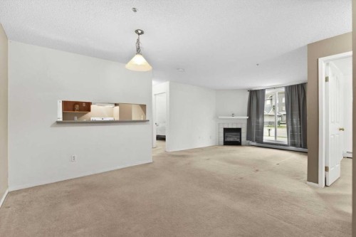 2113-2113 Tuscarora Manor Nw, Calgary, AB - Indoor With Fireplace