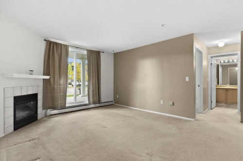 2113-2113 Tuscarora Manor Nw, Calgary, AB - Indoor With Fireplace
